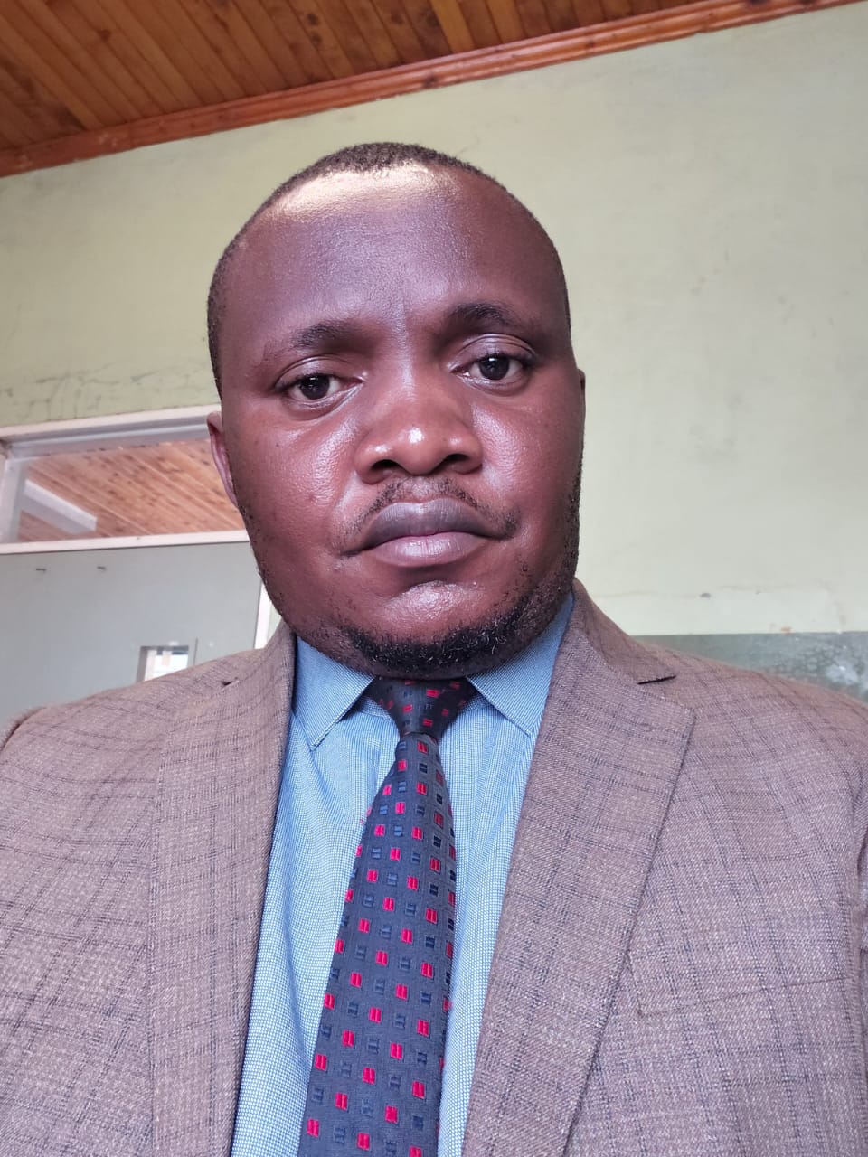 Dr. Baluku Simon